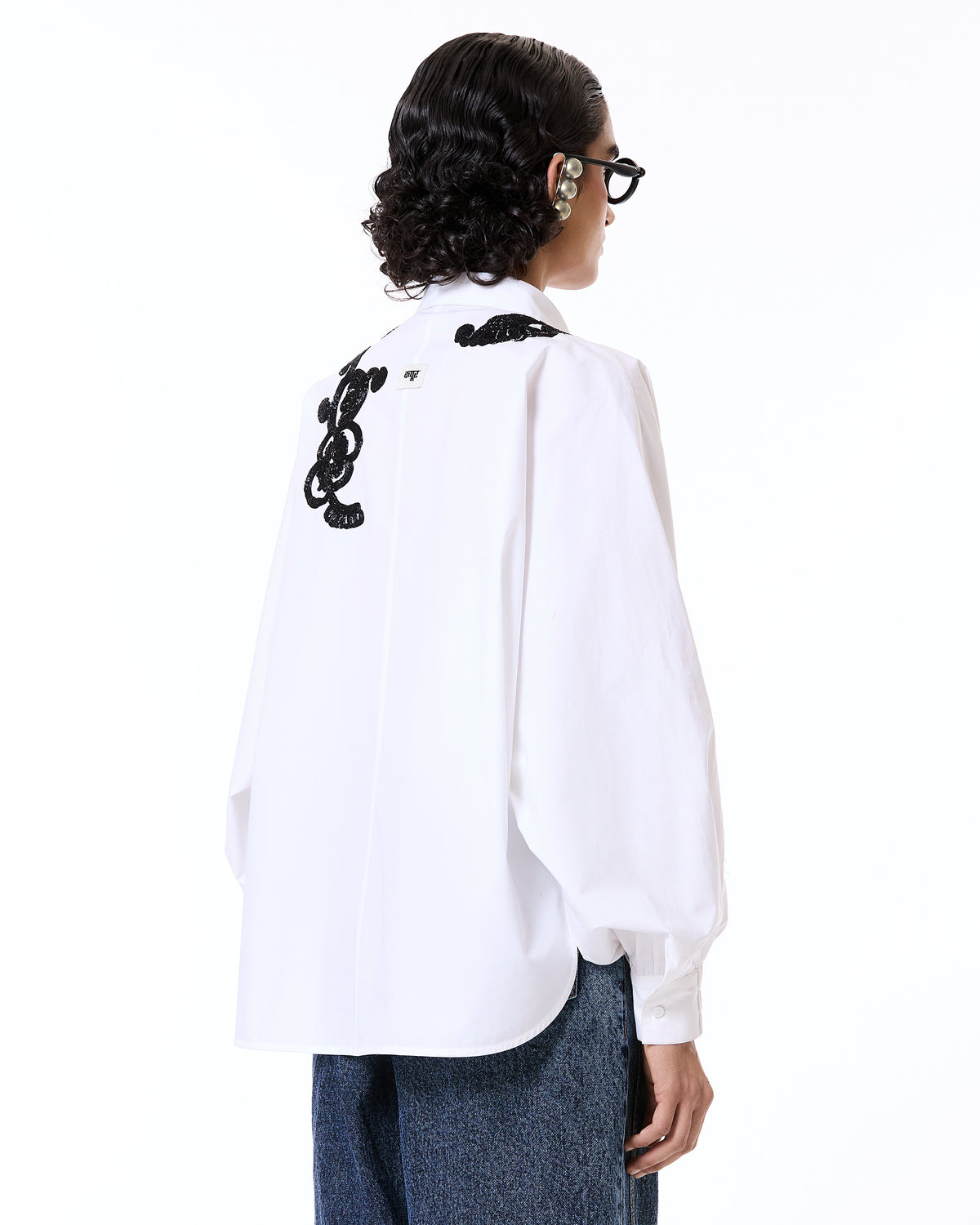 Handcrafted yoke batwing shirt